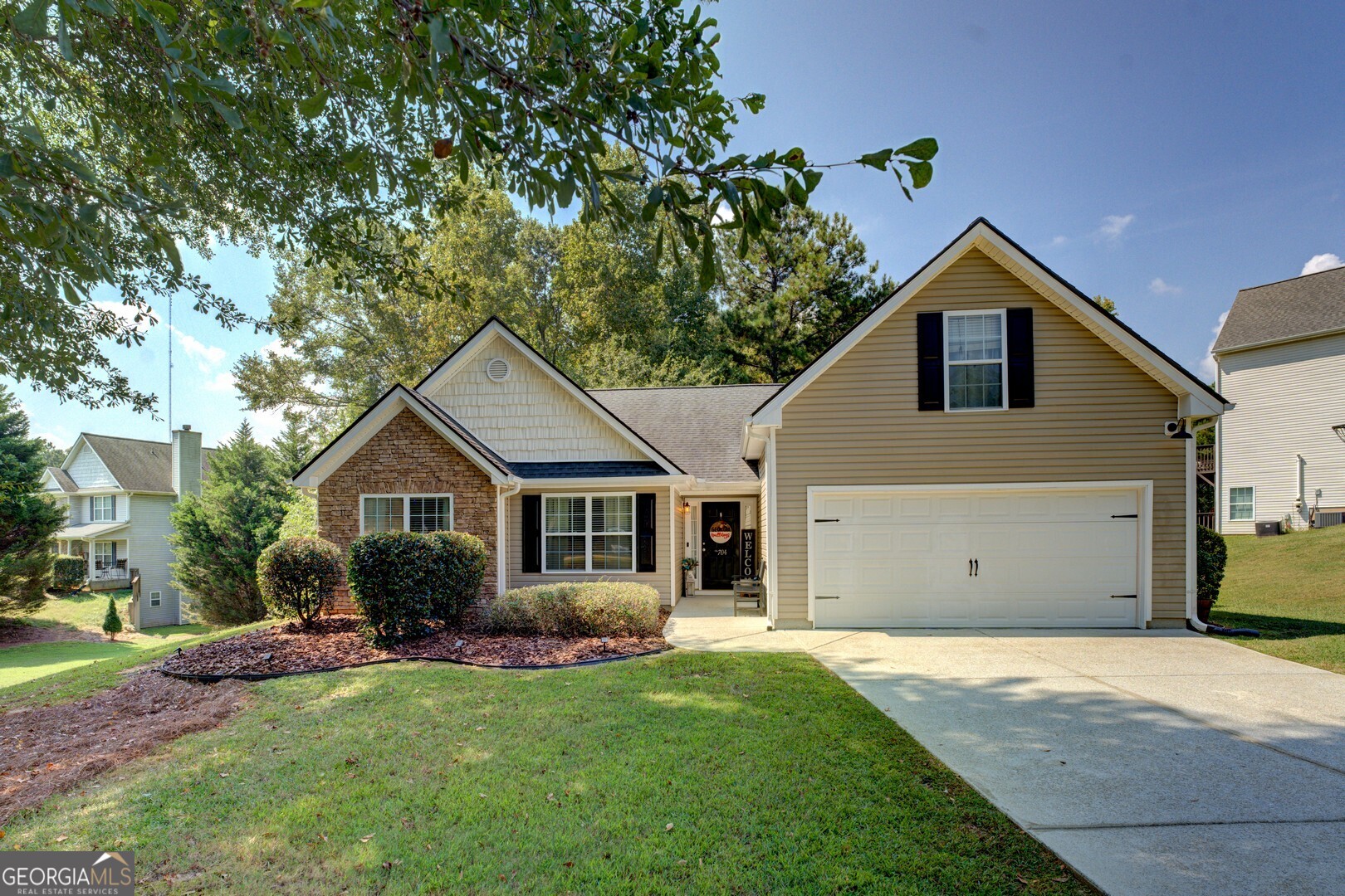 Well cared for ranch home on a culdesac street offers dining area (or flex space perfect for work from home), open and bright kitchen with breakfast bar, breakfast area and stainless steel appliances. Owner's suite with walk in closet, vaulted ceilings and bath with double vanity, large soaking garden tub and oversized separate shower. There is also a bonus room upstairs currently being used as a fourth bedroom. Enjoy grilling and barbeques on the covered patio with extended deck space. Great location convenient to dining and entertainment. Home is also located in a USDA 100% finance area!