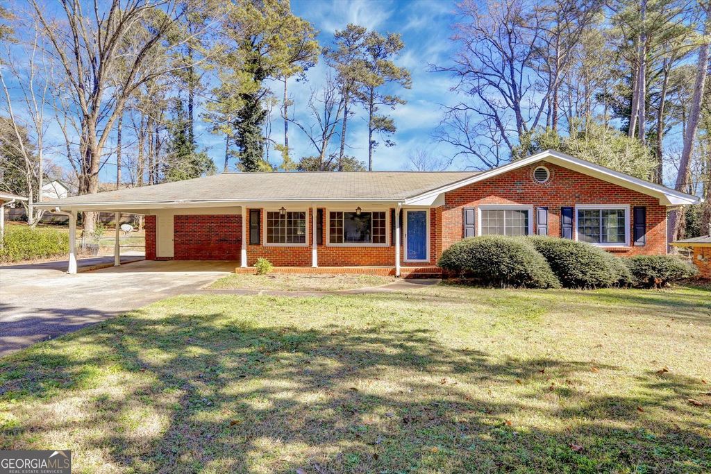 Photo of 1266 Hickory Drive SW, Lilburn, GA 30047 (MLS # 10674581)