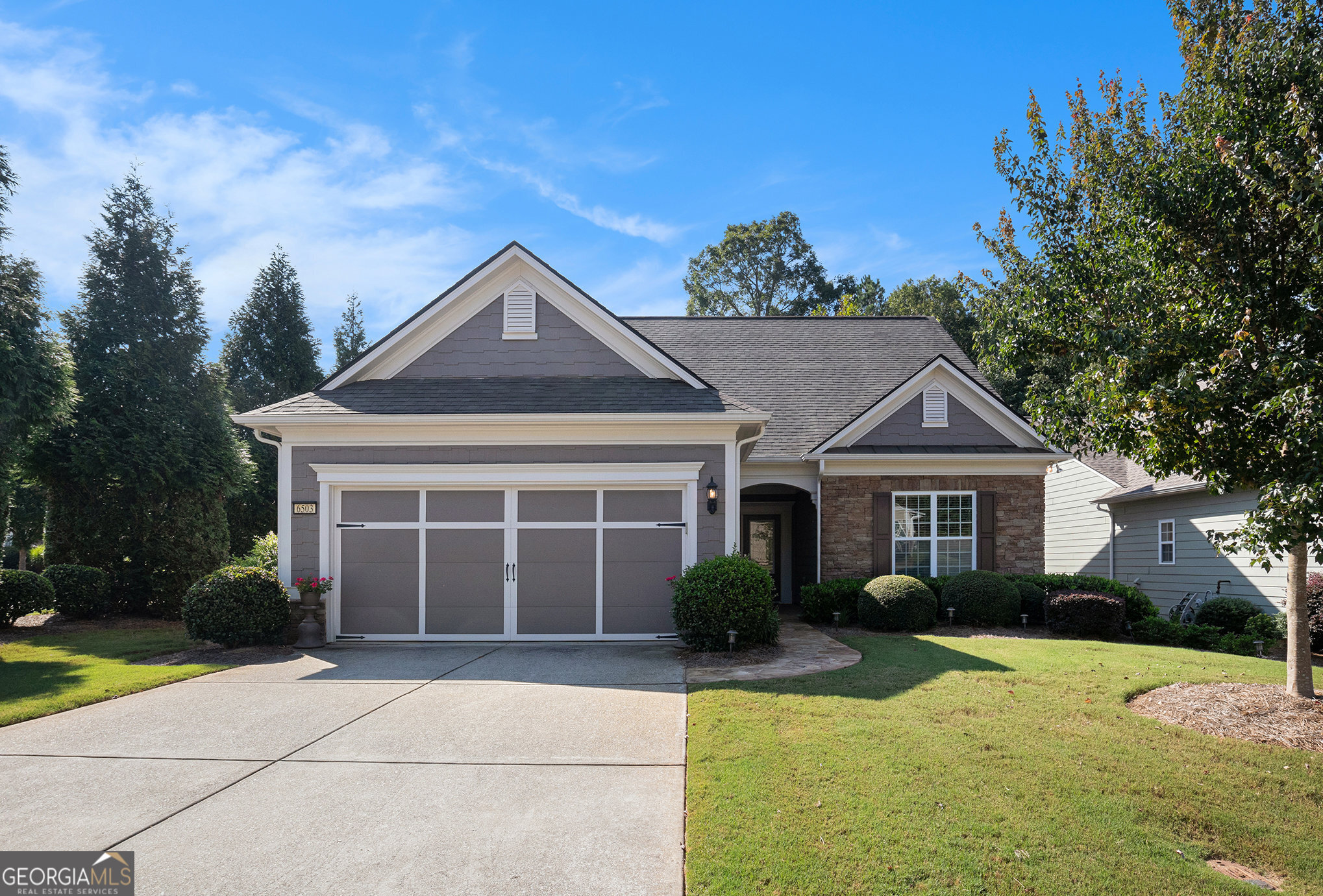 Get ready to be amazed by this incredible floor plan with an expansive upstairs loft featuring an additional bedroom and bathroom perfect for guests, crafts, or hobbies, situated on a premium corner homesite with a newly added custom sunroom ideal for relaxing mornings or evening grill-outs, located in one of Georgia's most beautiful and active 55+ communities offering over 100 clubs, a massive clubhouse, indoor and outdoor pools, tennis, pickleball, bocce ball, softball, 9 miles of walking trails and more, HOA maintains landscaping so you have more time to enjoy the superb location with shopping, dining, and medical facilities just outside the gates, call today to schedule your showing.