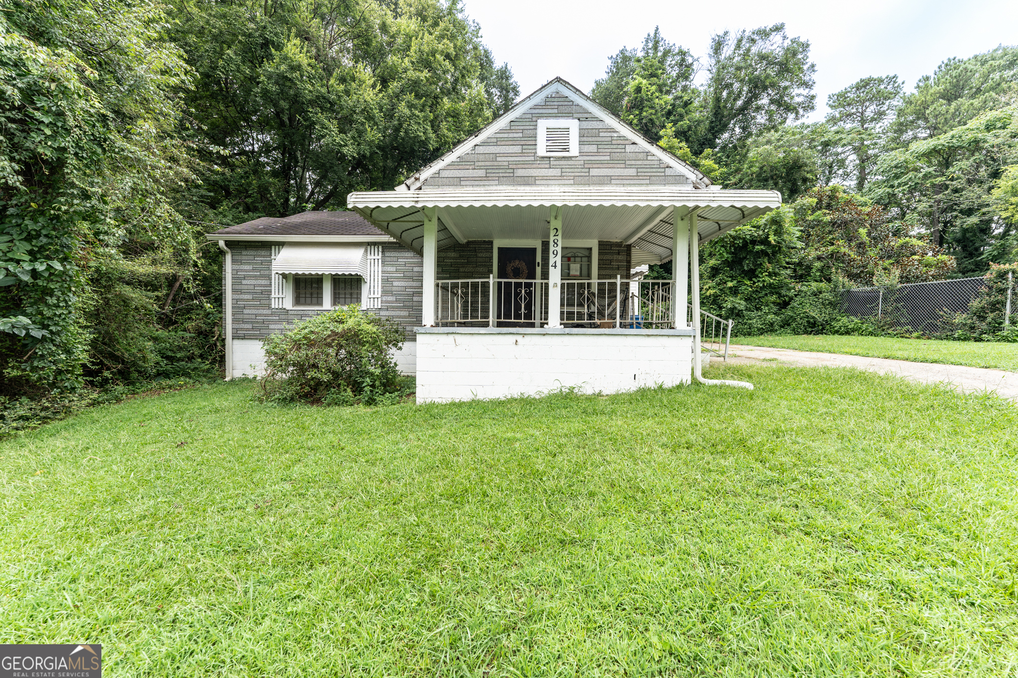Investor Special in Hammond Park! 2894 3rd Ave offers a great opportunity to add value with some elbow grease. Located just minutes from downtown and the BeltLine, this property is perfect for a flip, rental, or buy-and-hold. Solid bones and tons of potential-bring your vision and make it shine!