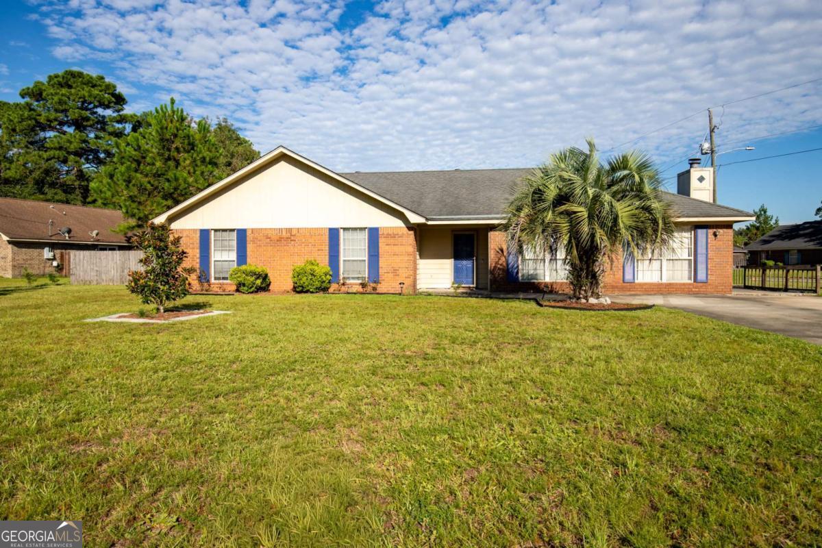 Welcome home to classic Hinesville affordability! Enjoy spacious living on a corner lot in Hawthorne with close proximity to restaurants, shopping, post office, downtown Hinesville, schools & 3 gate entrances to Fort Stewart. This brick home features vintage parquet flooring in the great room, formal dining, den & hallway that leads you to the bedrooms, durable tile flooring in the bathrooms, laundry, kitchen & breakfast areas, vaulted ceiling in the large great room & a wood-burning fireplace in the den. With ample space for living & entertaining both inside & out, youll enjoy convenient living at a price you can afford.
