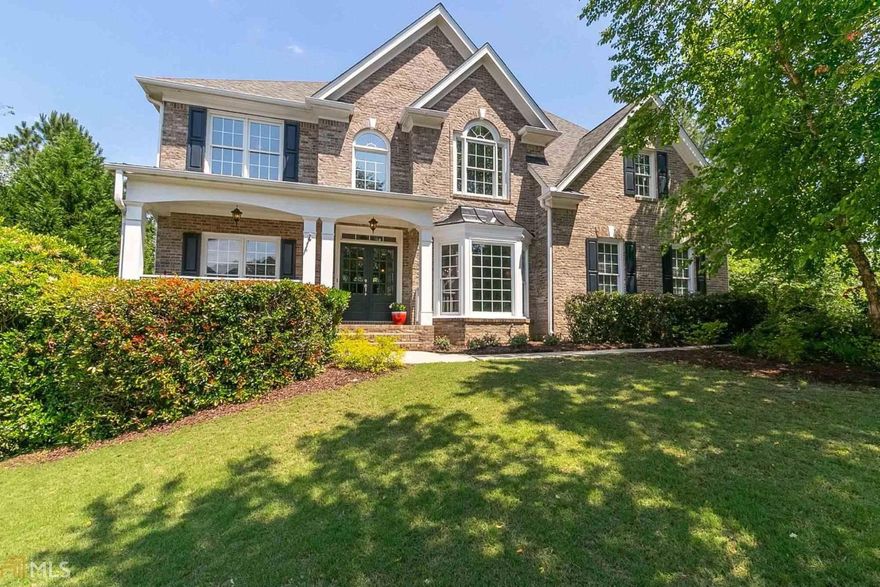 Located in Treybyrne in the heart of Hamilton Mill and just steps from Little Mulberry Park, this home has it all! Rocking chair front porch, beautiful hardwoods throughout, coffered ceiling and raised brick hearth in the great room, spacious breakfast area with bay window, and large kitchen all make this home a place to relax and enjoy. The freshly painted interior is icing on the cake! The top floor provides a media room, 3 secondary bedrooms with 2 full baths, and a master suite that offers 2 walk-in closets and en suite bath.The finished terrace level will not disappoint with a custom wet bar, entertainment rooms, indoor/outdoor speaker system, a bedroom and full bath and workshop area with separate exterior door. Landscaped yard with irrigation system provides a large fenced area with lots of flat space as well as a patio and freshly painted deck. Roof replaced in 2018; HVAC on the main 2019 and top floor 2016. Be sure to explore all the amenities the Hamilton Mill community and area has to offer.
