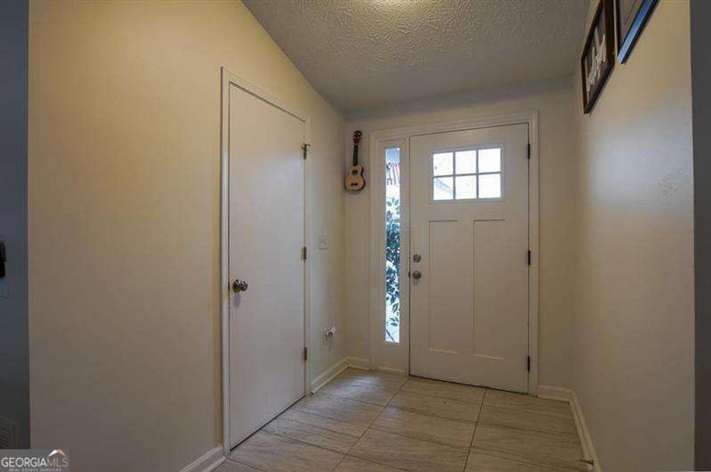 Photo of 1575 Canberra Drive, Stone Mountain, GA 30088 (MLS # 10676382)