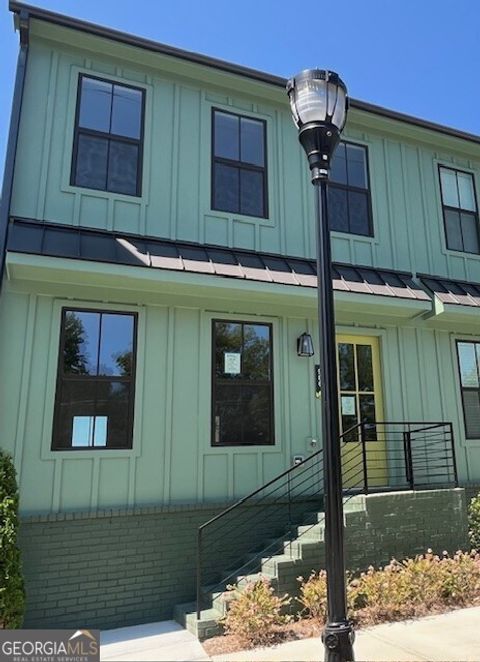 Photo of 966 Bibbs Circle Cir NW #10, Atlanta, GA 30318 (MLS # 10603896)