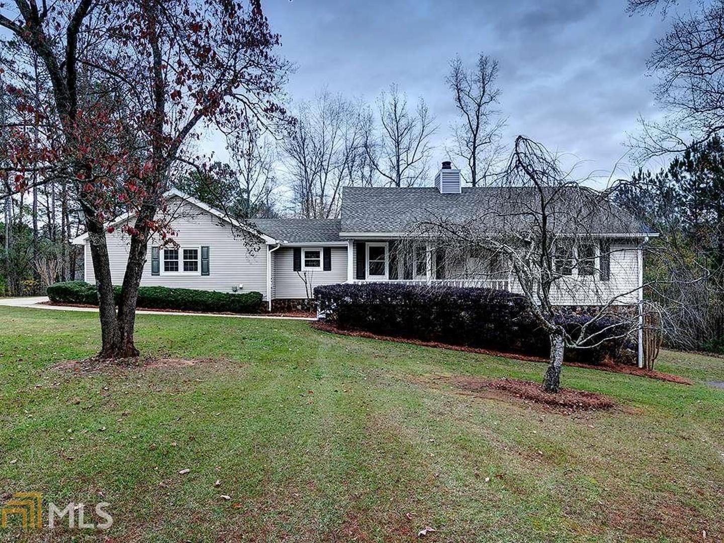 Beautifully Renovated & Perfectly Maintained 3BR/3BA Custom Ranch Home w/Full Finished Basement on 7 AC Private Lot. Master on Main Plus Family Room w/ Hardwoods, Custom Casing & Stone Fireplace w/Direct Access to Sunroom & Open Deck. Spacious Kitchen Features Granite Counters, Island, SS Appliances, Double Ovens, Walk-In Pantry, Coffee Bar. Finished Basement Includes Generous Living Space, Renovated Kitchen, Bath w/Tiled Floors, Granite Counters, SS Appliances, Separate Entry, Patio, Attached 2 Car Garage. Rocking Chair Front Porch, and MORE. Don't Miss This One!