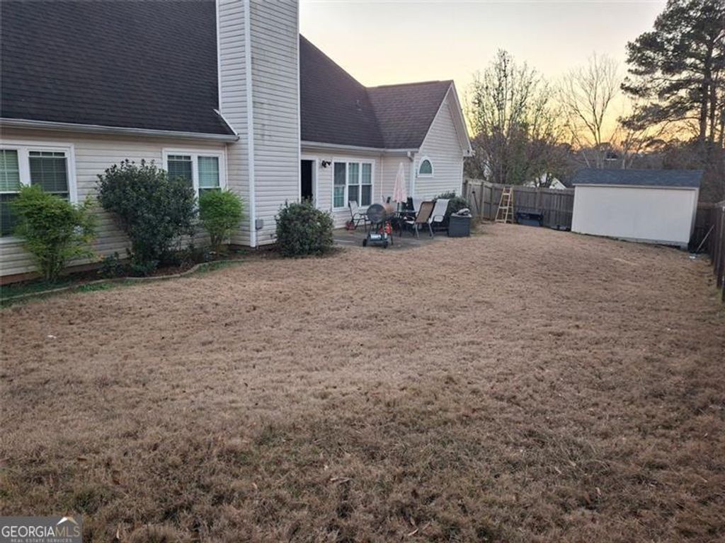 Photo of 84 PEBBLE CREEK Dr, Newnan, GA 30265 (MLS # 10662822)