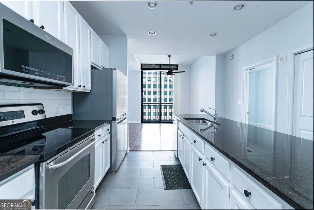 Photo of 3040 Peachtree Road #1501, Atlanta, GA 30305 (MLS # 10660562)