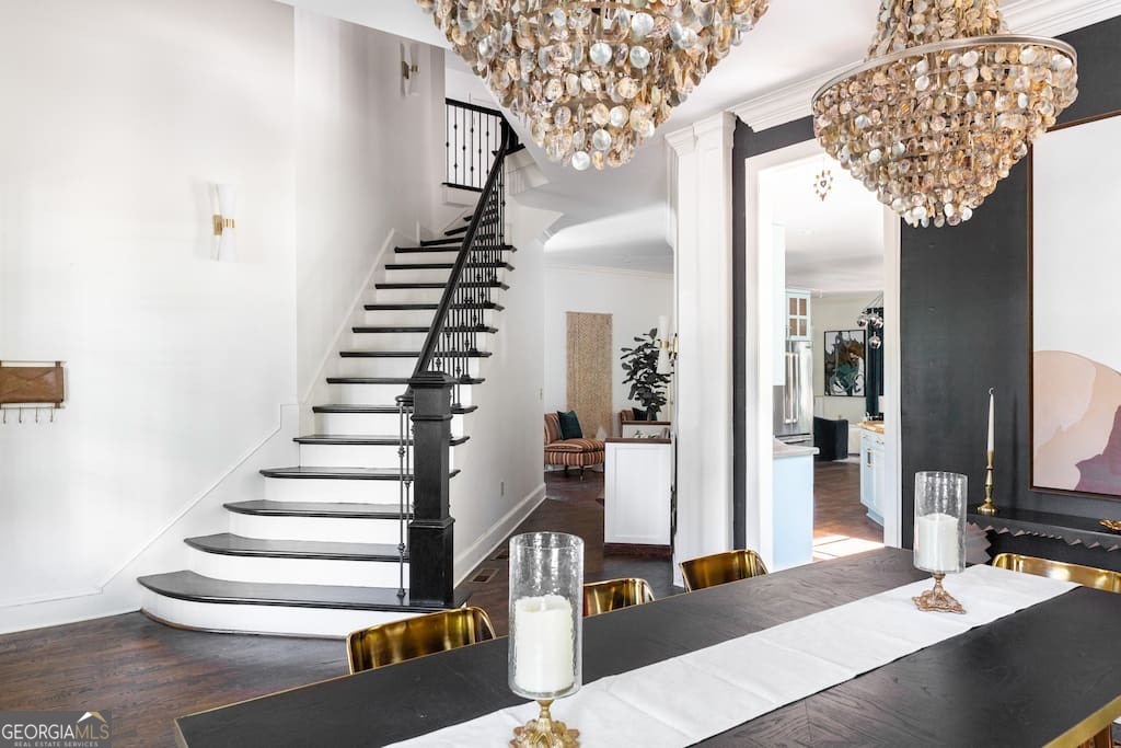 Welcome to 201 Hurt St NE, a FULLY FURNISHED 5-bedroom, 4-bathroom residence in the heart of Inman Park. This stunning home blends historic charm with modern luxury, featuring a two-story foyer, vaulted ceilings, and spacious interiors designed for both relaxation and entertaining. The main level offers multiple living areas, a large separate dining room, and beautifully furnished bedrooms with cozy mattresses, cotton linens, and plenty of closet space. The fully finished basement is a true retreat, complete with its own kitchen, bedroom, full bathroom, dining space, living room, and a game room featuring a pool table. With its own exterior entrance, this level is ideal for extended family, guests, or those needing extra privacy. Multiple fireplaces throughout the home create inviting gathering spaces, while skylights and feature details add vibrant character. Outdoor living is just as impressive with a large balcony and a covered lower patio, providing private spots to relax or entertain. For convenience and peace of mind, this home is equipped with in-unit laundry, fast WiFi, smart TVs, Ring doorbell cameras, and custom-coded keyless entries. All utilities can be included upon request, making for a seamless, turnkey lifestyle. Located in one of Atlanta's most desirable neighborhoods, you'll enjoy easy access to the BeltLine, local parks, and the vibrant restaurants and shops of Inman Park. This is a furnished rental with FLEXIBLE LEASE TERMS, and short-term stays are welcome with adjusted rates and utility options. PRICE LISTED IS BASED ON 12 MONTH LEASE. Contact agent for adjusted terms and prices. If you are displaced due to a hurricane or local event, please let us know - we are here to help.