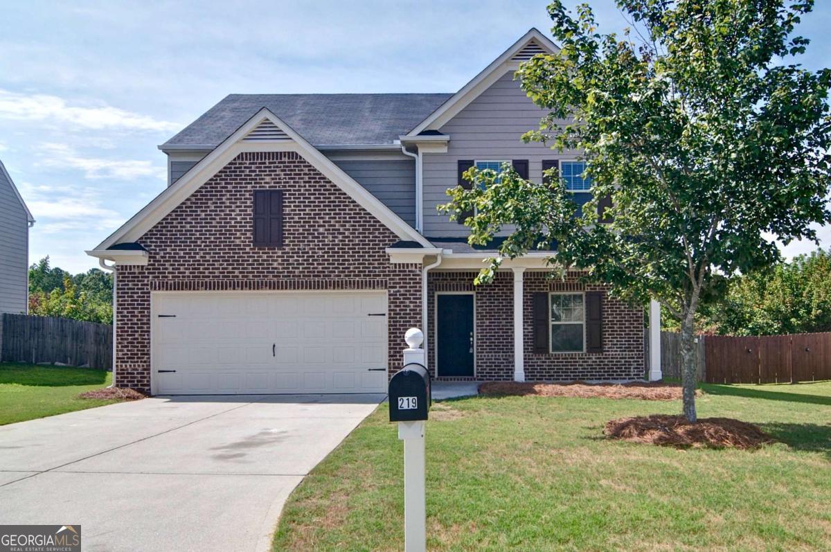 Back on the market with new carpets, new fixtures, fresh paint, custom cabinetry, and a protective roof overcoat! Welcome to 219 Aberdeen Way-where affordability meets comfort in the North Paulding High School District! Built in 2016, this 4-bedroom, 2.5-bath home features an open floor plan with space to accommodate family and friends. The private, fenced-in backyard is the cherry on top for those who love to entertain, or for families with younger children! The community provides swim & tennis, as well as convenience for dining, shopping and entertainment.