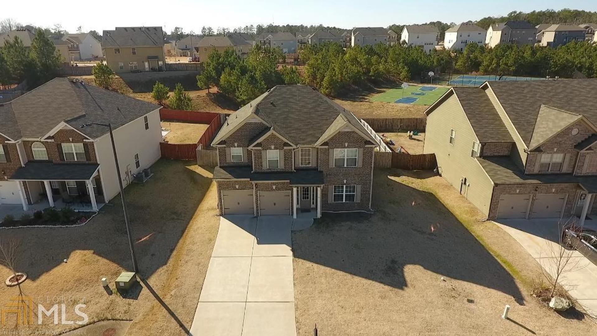 Priced to sell! This lovely 4BR/3Ba home built in 2014 has all the bells and whistles and priced well below new construction. This home has too many features to list but here are some items: fenced yard, granite counter tops, tile floors, stainless appliances, large rooms, fireplace and 2 car garage w/ auto doors, stained cabinets, sep. garden tub and tiled shower in master.