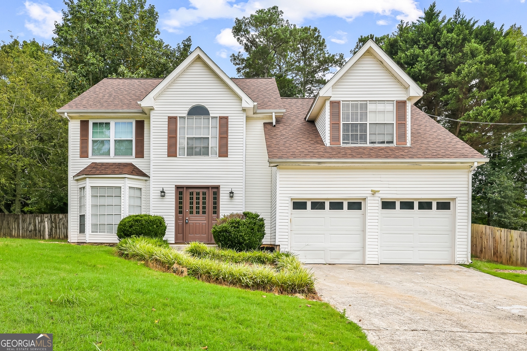 Introducing 1905 Rocksram Drive. Managed by EXCALIBUR HOMES. Inviting 3 bedroom 2.5 bathroom home with HUGE FENCED BACKYARD features beautiful hardwood floors on the main level. **WASHER and DRYER INCLUDED**. Minutes from Mall of Georgia, shopping, fine dining and entertainment. Easy access to I-85, Buford Drive and Hwy 316. Excalibur Homes does not advertise on Facebook or Craigslist. Be advised that the sq ft and other features provided may be approximate. Prices and/or availability dates may change without notice. Lease terms 12 months or longer. Application fee is a non-refundable $75 per adult over 18 years of age. One-time $200 Administrative fee due at move-in. Most homes are pet-friendly. Breed restrictions may apply. Rental insurance required.