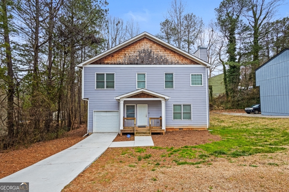 Welcome to 6945 Merrywood Dr, Fairburn, GA 30213! This well-maintained 2017-built home sits on a nice, level lot in a quiet, established neighborhood with no HOA restrictions-giving you the freedom to enjoy your property your way! Inside, you'll find three huge bedrooms and a layout that's both functional and inviting. Tired of hard-to-decorate open floor plans? This home offers the perfect balance of space and structure, making it easy to create cozy, defined living areas. The spacious kitchen is a true highlight, featuring ample counter space, modern appliances, and a dedicated coffee counter-perfect for starting your mornings right! Step outside to a large deck, ideal for entertaining, grilling, or simply unwinding in your private backyard. With a prime location near schools, shopping, and major highways, this gem is an unbeatable find under $300,000! Schedule your showing today