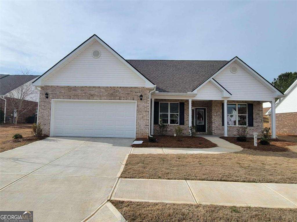 This picturesque three-bedroom ranch home, The Trenton floor plan by Riz Communities, is not a home to be missed. Step inside to discover a spacious family room a cozy fireplace creating a welcoming atmosphere for gatherings with loved ones. The sunroom serves as a sanctuary, flooded with natural light and offering a tranquil setting to unwind and soak in the beauty of the outdoors, with direct access to the private patio. Tucked away in a peaceful neighborhood, this meticulously maintained residence exudes charm and character at every turn. The well-appointed kitchen features modern stainless-steel appliances, granite countertops, ample cabinetry, and a breakfast nook, perfect for enjoying your morning cup of coffee. Retreat to the primary bedroom suite, complete with a private ensuite bathroom and a cozy ambiance for rest and relaxation. Two additional bedrooms provide flexibility for guests, a home office, or a creative space. Outside, discover a meticulously landscaped yard, featuring lush greenery, a patio area for outdoor dining and entertaining, and ample space for gardening or recreation. With its desirable amenities and idyllic setting, this ranch home with a sunroom presents a rare opportunity to embrace comfortable and elegant living. Peaceful Southern Living doesn't get better than this!