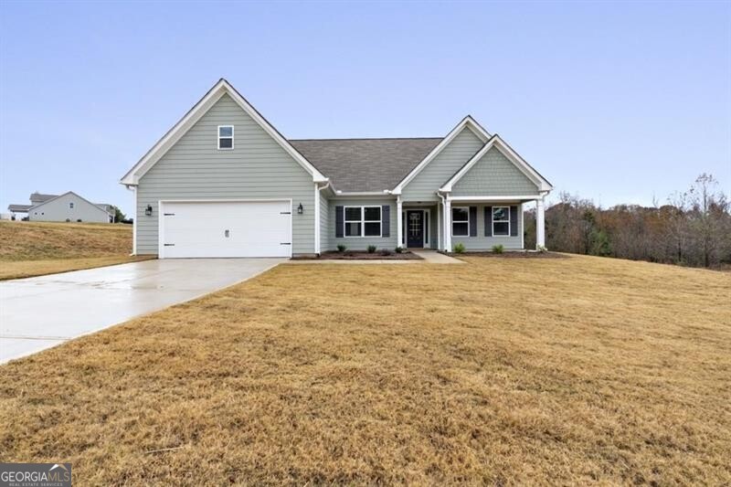 Master on main, beautiful and spacious with a convenient location of HWY 441, minutes from Downtown Commerce, TANGER OUTLETS, Flea Markets, I85, Ingles and much more! Open floor plan, separate dining room, living room with high ceiling and stone wood burning fireplace, kitchen with all appliances included, pantry, breakfast area. Large laundry room. Master with sitting area, walk in closet. Master bath with separate bathtub and shower, double vanity. Spacious secondary room AND full bed/bath UPSTAIRS! Back covered patio! NO HOA, ALL ELECTRIC!! Large lot, perfect for entertaining. ***We DO NOT list rentals on Craigslist nor Market place. Only communicate with The Gwin Team, beware of rental scams - this house is professionally listed and managed by The Gwin Team, ONLY speak with a member of The Gwin Team***