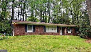 Explore this exceptional investment opportunity! This property hosts a licensed residential senior care facility that has been successfully operating for over 20 years. The tenant is prepared to sign a long-term lease and historically demonstrates reliability with on-time payments. The current 3 year lease features a gradual annual increase, starting at $3,800 per month, rising to $4,000, ensuring a dependable and solid income stream. The property boasts 7 bedrooms, 3 bathrooms, and an additional office area, with a size larger than indicated in tax records. Recently upgraded, the home features a new kitchen with elegant granite countertops and stainless steel appliances, high-quality vinyl plank flooring in most areas, fresh interior paint, and updated light fixtures. HVAC systems were replaced in 2017 and 2018, and the exterior benefits from new concrete siding and paint in 2018, along with a new roof in 2019. All three bathrooms were remodeled in 2023. Situated in a convenient location close to I-285 and I-85, shopping, and dining, this property is primed for minimal maintenance costs for the new owner.