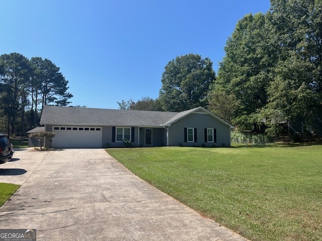 Totally turn-key and pristine! This is a perfect 10! 3 bedrooms, 2 full and one half bath. Full, fenced, 1 acre lot. Huge outbuilding/workshop for lots of extra storage. Vaulted great room, brick fireplace, private office with french doors off of foyer. Large, eat in kitchen, nice stainless fridge and dishwasher. Huge laundry room with built in cabinetry. Separate half bath/mudroom in garage for kiddo clean up or gardening wash off! Oversized bedrooms, Master on main large enough for kingsize++ bed. Great walk in closet, private bath with separate linen closet just for the owner. Freshly painted exterior and updated roof. Neutral and high quality interior finishes. Super nice! Appointment only.