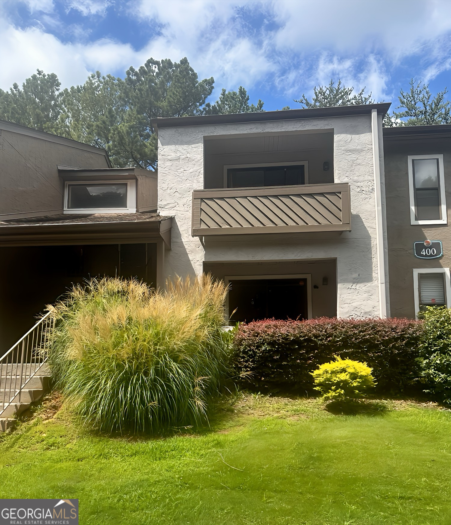 Welcome to Norcross! This condominium, perfectly situated in the vibrant heart of Norcross! Located just minutes from I-85 and Jimmy Carter Boulevard. This condominium offers vinyl flooring and carpet throughout and includes all essential appliances for your convenience. The kitchen is a true highlight being and bright, rich stained cabinetry, stove and dishwasher will remain. Located on the desirable 2nd floor. Private screened-in sunroom or sip your morning coffee on the welcoming front porch. Set within a secure, gated community, residents enjoy access to a host of premium amenities, including a modern fitness center, a children's playground, a sparkling pool, on-site laundry facilities, and ample parking. Despite its peaceful setting, the location offers unparalleled convenience to shopping, dining, entertainment, and all that Atlanta has to offer. With no rental restrictions, this property presents an exceptional opportunity for Airbnb hosting or long-term rental investment. Whether you're looking for your dream home or a high-potential income property, this condominium checks every box.