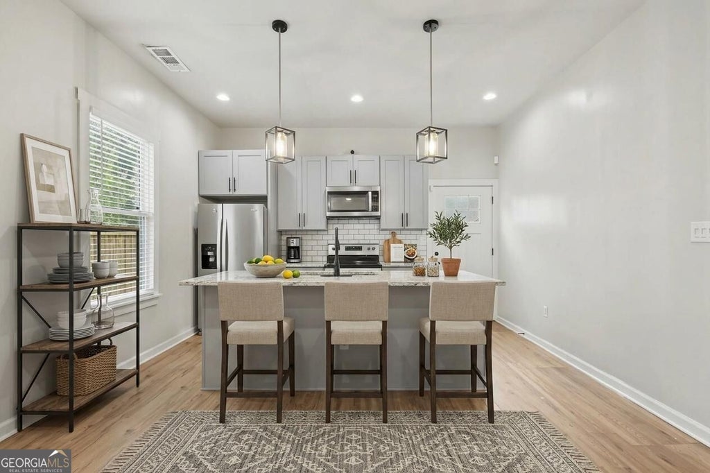 Photo of 31 Mildred Place NW, Atlanta, GA 30318 (MLS # 10848091)