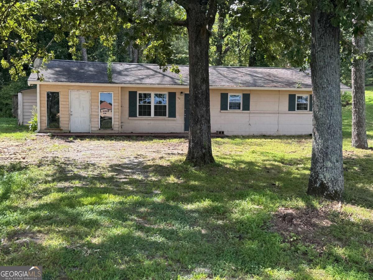 This classic block home offers incredible potential for the right buyer. Sitting on a generous .7 acre lot, the property provides one-level living with a solid foundation and great bones.While the home is in need of a complete renovation, many of the big ticket items are already in place. Including a newer HVAC system, a good roof ,and energy efficient thermal pane windows.m The layout and construction make it an ideal candidate for a full remodel whether your looking to renovate and resell. Create a rental property. This spacious lot allows room for outdoor living ,gardens, or expansion. A super location close to Lake Allatoona, I75,downtown Cartersville. Looking for cash buyers. Call Peter for access and additional details.