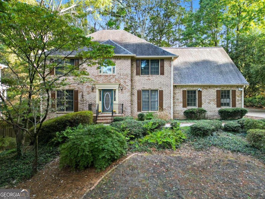 Sope Creek / Dickerson / Walton + Executive Size Home + Financing Incentive = A deal you do not want to miss!    Discover this exceptional 5 bed, 5 bath home in the coveted River Mill community. Giant family room. Over 4,500 sq ft of elegant living space featuring lots built-in shelving, a bright sunroom, and a fully finished basement with wet bar and multiple washer/dryer hookups. Bedroom and full bath on the main. The driveway provides plenty of parking, and the fenced backyard is ideal for play and pets. Easy access to shopping, dining, and major highways.    Seller offering $8,000 lender credit with acceptable offer via preferred lender Thomas Cady - Onward Home Mortgage -  NMLS: 1017319.