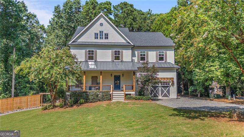 One of the best locations on Lanier! First time on the market - south end beauty off of Buford Dam Road in a quaint cul-de-sak among multi-million dollar homes. Just a short, gentle walk to the single slip dock (permitted for a double slip) where you can enjoy sunrises and a wide open water view on super deep water. Over $150,000 of river rock riprap covers the three lots on the point where the dock (with a new roof) is located. Never on the market - custom builder's personal home with all of the extra's thoughout - no detail has been missed! This immaculate/move-in ready home offers 4 ample sized bedrooms and 4 full baths - all upgraded tile, granite, etc. This wide open floor plan, with beaming hardwoods and shiplap on main, is perfect for large gatherings and entertaining. The extra large kitchen includes 2 separate islands, 2 sinks, stainless steel appliances, granite countertops, and subway tile backsplash. The owner's favorite "room" is the oversized screened in porch that includes an outdoor fireplace and tongue and groove ceilings. The outdoor grilling space (also under roof) is perfect to enjoy nature and the new built-in hottub. All new paint August 2025 - exterior and mainfloor interior. Upstairs interior painted 2024. This homes also offers a massive movie room/workout room (could be used for bunks, etc) for everyone to enjoy! Located off of GA400/exit 14, close to Cumming City Center, retail, and restaurants. Currently on Septic but has been approved by the county to hook up to sewer if interested.