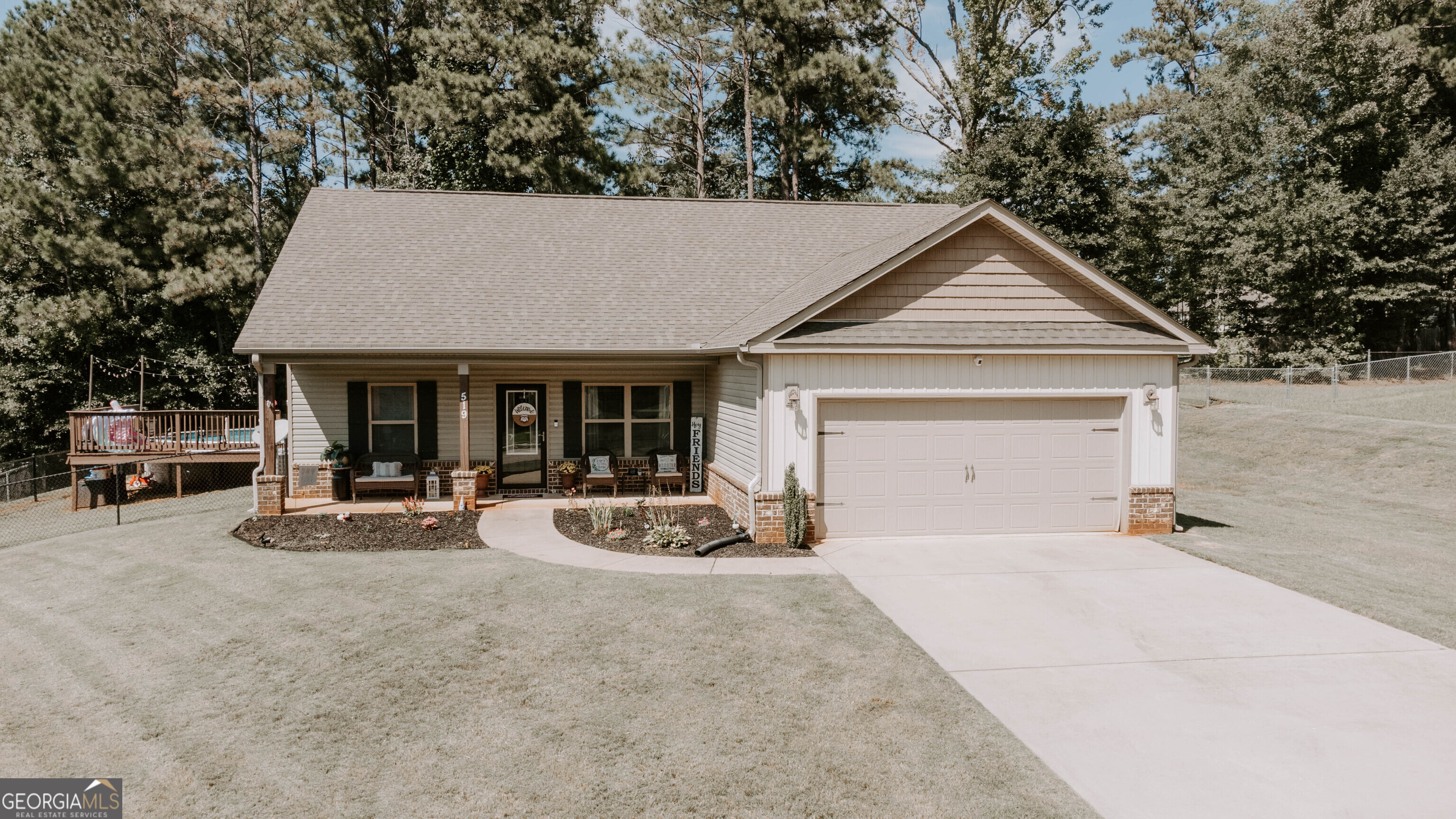 If you are looking for a newer built, very well maintained, low maintenance home, with no HOA, look no further than 519 Knollwood Dr. As you enter this beautiful home you will love the open concept. The living room features vaulted ceilings. The kitchen is a perfect spot for entertaining guest. There are newly updated fixtures throughout the home. This house is a split bedroom plan. The master features a trey ceiling with walk in closet. The on suite bathroom has a double vanity, soaking tub, and a seperate shower. Step outside to your backyard oasis complete with covered patio with stamped concrete and fireplace. The fenced backyard also offers a pool with a cozy deck. This house wont last long. Call for you private tour