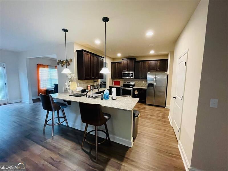 This modern 4-bedroom, 2.5-bath home, built in 2020, is a rare rental opportunity in a private, gated residential community. Unlike older homes or townhomes, this spacious single-family residence offers contemporary finishes and a prime location just minutes from the Atlanta Motor Speedway and downtown Hampton. The fenced backyard provides a great space for entertaining, and the oversized master suite features a generous walk-in closet. Applications are processed through RentSpree. Appointment required for showings.