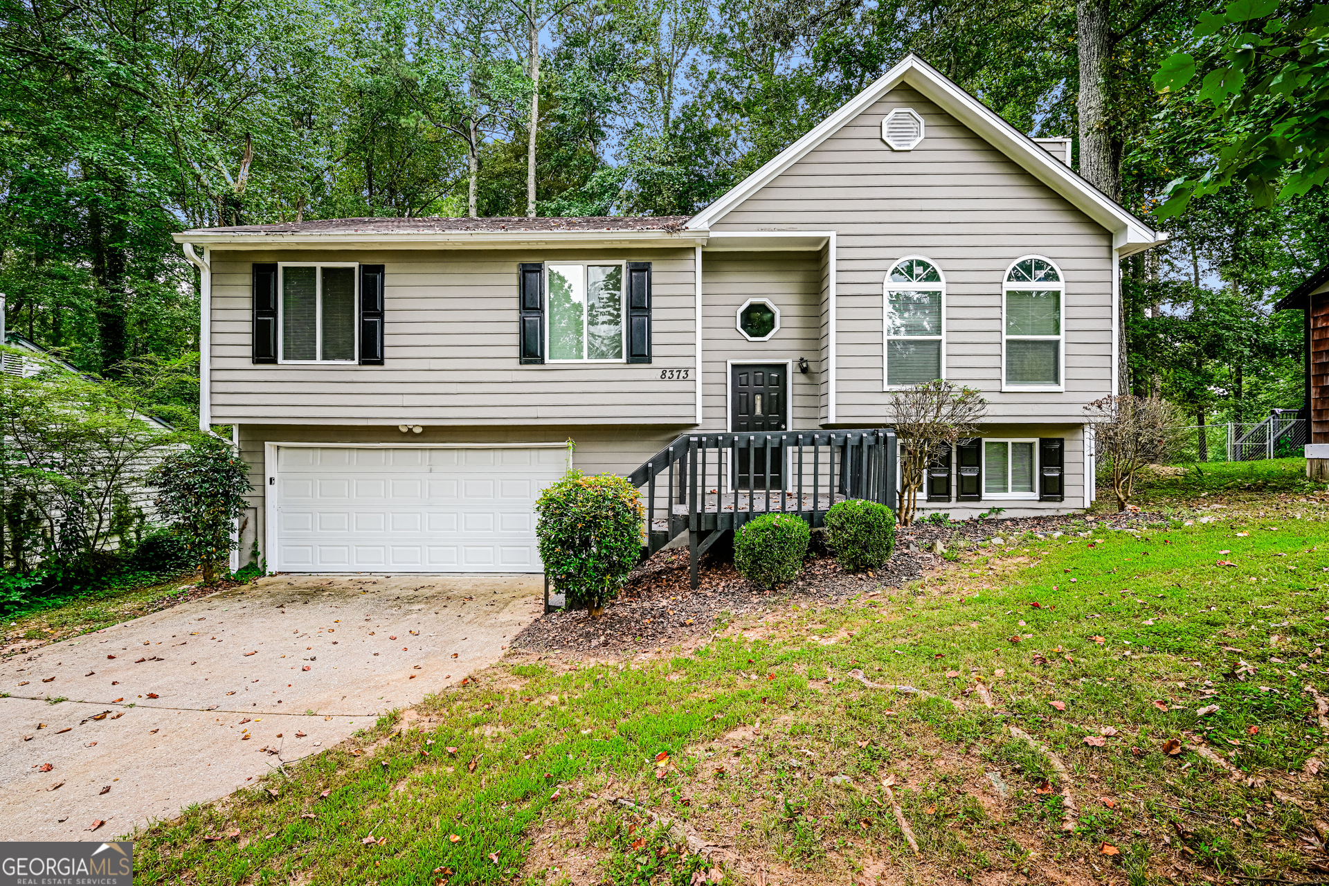 Charming home in the sought-after Norris Lake community! Enjoy access to a private 90+ acre lake, sandy beach, pool, tennis, clubhouse & playgrounds. This property offers a bright, open floor plan with spacious living areas, functional kitchen & comfortable bedrooms. Large backyard provides plenty of room for outdoor enjoyment. Conveniently located near shopping, dining & top Gwinnett schools. Don't miss this opportunity to live in a rare lake community-schedule your showing today!