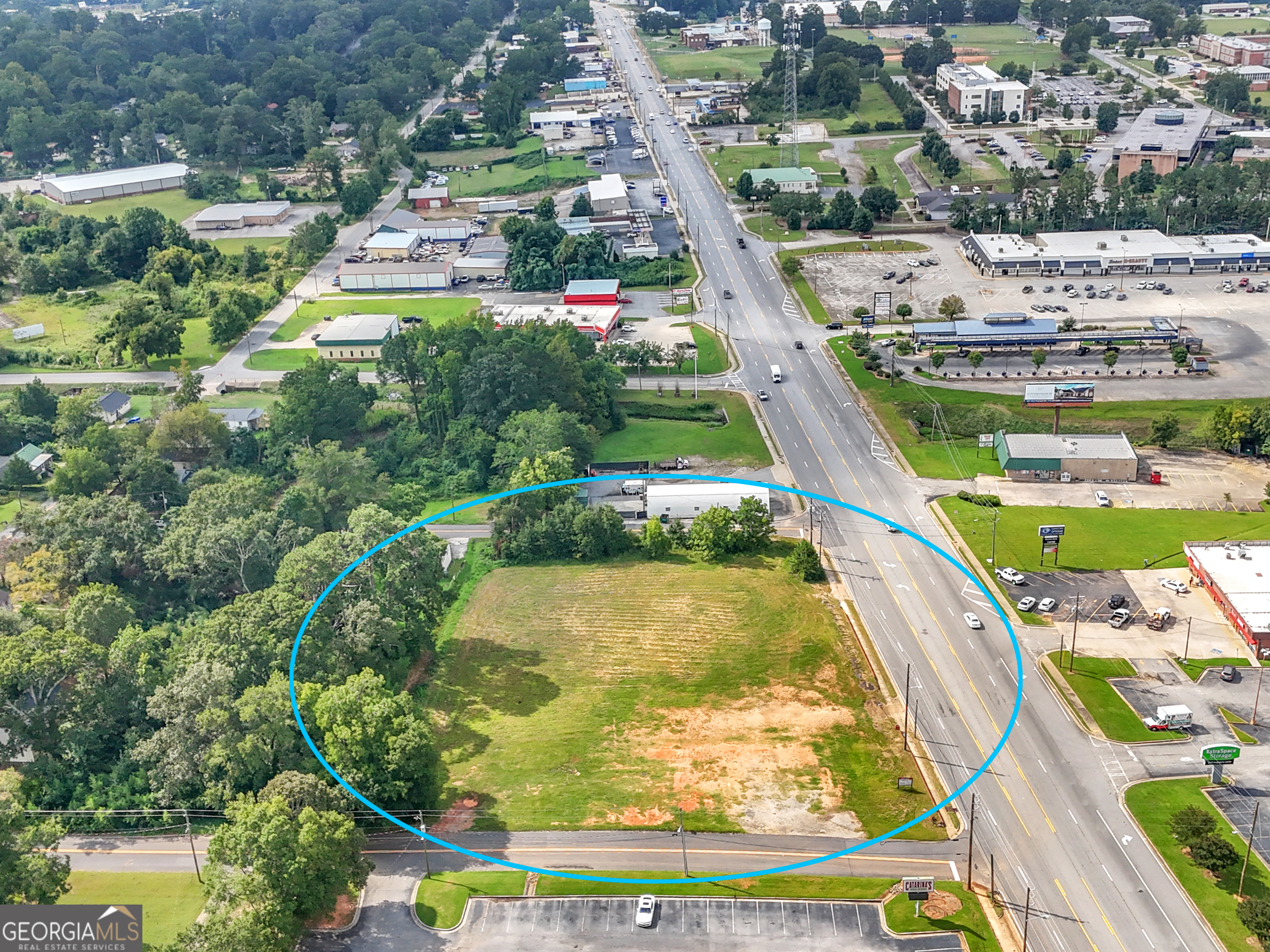 Prime Commercial Opportunity! This offering includes two parcels totaling 2.21 acres with triple road frontage, providing outstanding access and visibility. The property is cleared and ready for development, making it an ideal site for your next business venture. Located in a high-traffic area with excellent exposure, this site is zoned PCD (Planned Commercial District), allowing for a variety of potential uses. Don't miss the chance to secure a strategic commercial location in a rapidly growing market!