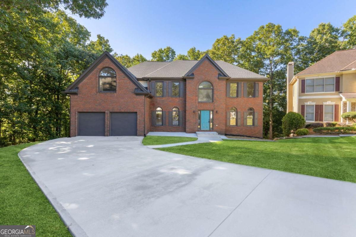 METICULOUSLY RENOVATED & MOVE-IN READY! THIS EXQUISITE 6 BED 3.5 BATH HOME BOASTS A FULLY FINISHED BASEMENT WITH SEPARATE KITCHEN AND PRIVATE OUTSIDE ENTRANCE - PERFECT FOR MULTI-GENERATIONAL LIVING OR RENTAL INCOME. ENJOY A SPACIOUS, FUNCTIONAL LAYOUT DESIGNED FOR MODERN LIVING. THE MAIN LEVEL FEATURES AN OPEN FOYER, HIGH CEILINGS, A BRAND NEW DOUBLE KITCHEN WITH QUARTZ COUNTERTOPS, STYLISH BACKSPLASH, ISLAND, AND STAINLESS STEEL APPLIANCES. UPGRADES INCLUDE: 3-LAYER ARCHITECTURAL ROOF, NEW HVAC, NEW LVP FLOORING, NEW DRIVEWAY, NEW BATHROOMS WITH GLASS TILE, NEW VANITIES & MODERN GLASS DOORS, NEW DECK, AND FRESH INTERIOR & EXTERIOR PAINT. THE UPPER LEVEL OFFERS A LUXURIOUS MASTER SUITE WITH TREY CEILING, WALK-IN CLOSETS, SOAKING TUB & SEPARATE SHOWER, ALONG WITH 3 ADDITIONAL BEDROOMS AND A FULL BATH. THE FINISHED BASEMENT FEATURES 2 ADDITIONAL BEDROOMS, A FULL KITCHEN, LIVING AREA, AND A PRIVATE ENTRANCE - IDEAL FOR EXTENDED FAMILY OR INCOME POTENTIAL. NESTLED NEAR STONE MOUNTAIN PARK, TOP-RATED SCHOOLS, SCENIC TRAILS, AND SHOPPING - THIS HOME OFFERS SPACE, STYLE & CONVENIENCE. THE LARGE BACKYARD WITH NEW DECK IS PERFECT FOR FAMILY ACTIVITIES & PETS. DON'T MISS YOUR CHANCE TO OWN THIS ONE-OF-A-KIND GEM. SCHEDULE YOUR SHOWING TODAY!