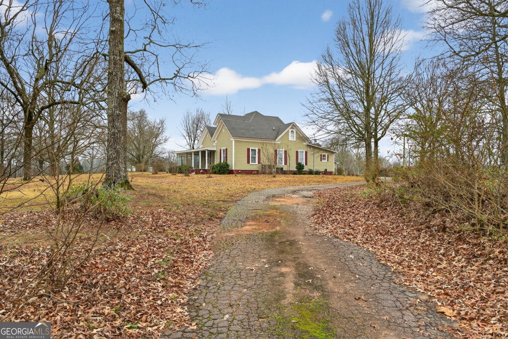 Photo of 402 Tom Bell Road, Milner, GA 30257 (MLS # 10839685)