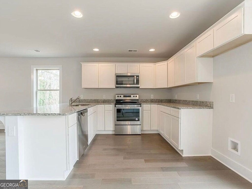 Photo of 1880 Sawnee Trail, Cumming, GA 30041 (MLS # 10851027)