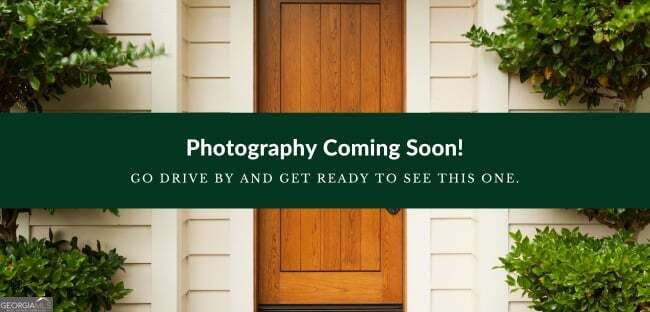 Photo of 4875 Pinnacle Drive, Stone Mountain, GA 30088 (MLS # 10881445)