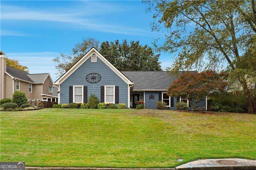 Updated Single-Level Living in Prime Johns Creek Location!    Discover this meticulously maintained and updated single-level ranch in a prime Johns Creek location! This home features a desirable East-facing orientation, offering a warm, welcoming entrance that captures the gentle morning sun. Inside, the open floor plan features a spacious family room with a cozy gas fireplace, which flows through a premium Anderson sliding door to a private, fully fenced backyard. This home offers tremendous storage and a large owner's suite, a true retreat with a modern frameless glass shower and separate soaking tub. Move in with total peace of mind, as this home is truly turn-key: professionally deep cleaned (Oct 2025) and featuring brand-new carpet (Oct 2025). The list of major updates is exceptional, including a FULL ROOF REPLACEMENT (2023), ALL NEW HARDY BOARD SIDING (2021), a RELIABLE NEW FURNACE (2021), and a NEW DISHWASHER (2025). Additional upgrades include a new garage door opener (2022), refrigerator (2021), and double-pane insulated windows. This location offers unparalleled convenience, minutes from GA-400, 141, premier shopping, dining, Emory Johns Creek Hospital, and parks like the Big Creek Greenway. Zoned for the award-winning Lake Windward Elementary, Taylor Road Middle, and Chattahoochee High School district. Residents are part of the Caney Creek Recreational Association, enjoying a clubhouse, pool, and active tennis courts (Rentals not allowed). This is a rare opportunity to find a beautifully updated home where all the work has been done. Move in and be settled just in time for your seasonal gatherings!