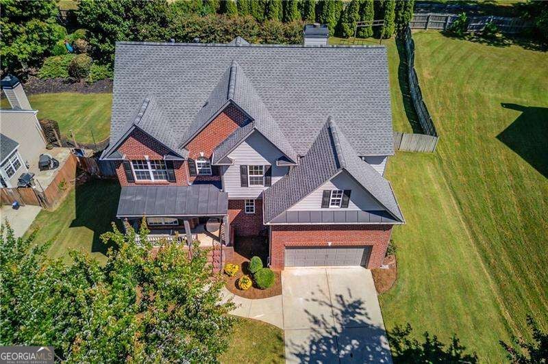 Photo of 3671 Devenwood Way, Buford, GA 30519 (MLS # 10856903)