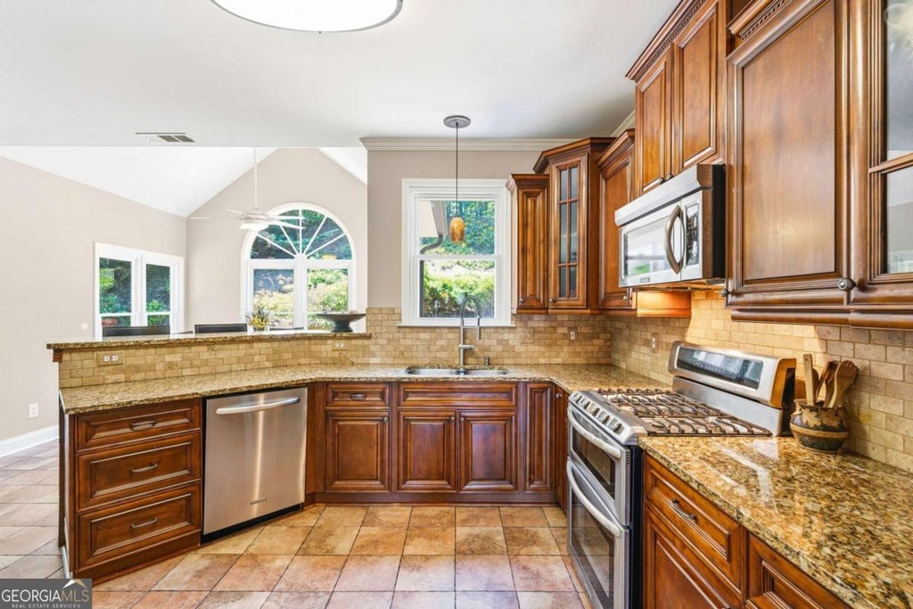Photo of 3050 Ridge Oak Drive, Suwanee, GA 30024 (MLS # 10785135)
