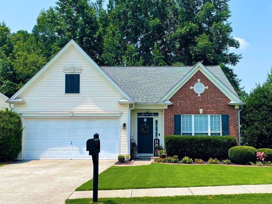 No showings until Friday 7/30/2021. Please use showing time. Beautiful 2 bedroom 2 full bath ranch located in desirable Woodstock. This newly renovated home offers a spacious open floor plan with newly remodeled kitchen and bathrooms! This home offers new interior paint, new carpet, new roof and a beautiful private wooded backyard with a fire pit area ripe for entertaining!  Enjoy the scenery of the private fenced in backyard from the covered screened in back porch. This home, near Towne Lake, is minutes away from Historic Downtown Woodstock and walking distance to The Outlet Shoppes of Atlanta in a community that backs up to Little River and Lake Allatoona and is surrounded by biking and hiking trails throughout.