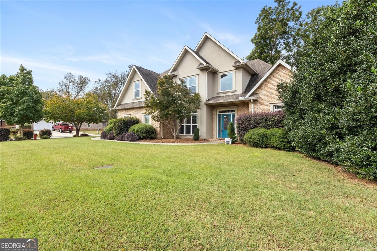 Assumable 2.375% VA mortgage and comes with a home warranty for added peace of mind. Lake Joy Elementary, Feagin Mill Middle and Houston County High school Districts! Welcome to this beautiful recently updated all-brick home in the highly sought-after Kensington community! Built in 2011 and situated on a spacious corner lot, this 5 bedroom, 2.5 bath gem offers the perfect blend of comfort and style. Enjoy two cozy fireplaces-one in the living room and another in the keeping room-plus a separate dining area ideal for entertaining. The primary suite is conveniently located on the main level, and the private, fenced backyard adds extra appeal. This home also features an assumable LOW insterest rate VA mortgage and comes with a home warranty for added peace of mind. Don't miss this exceptional opportunity!