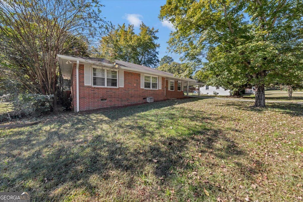 Photo of 1215 Eastview Road NE, Conyers, GA 30012 (MLS # 10879941)