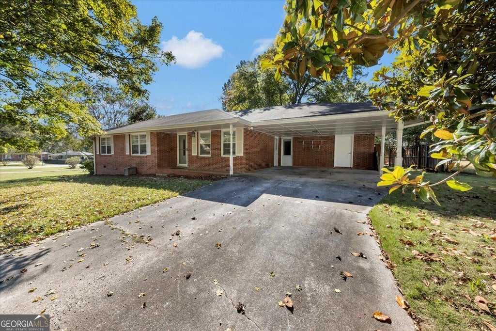 Photo of 1215 Eastview Road NE, Conyers, GA 30012 (MLS # 10879941)