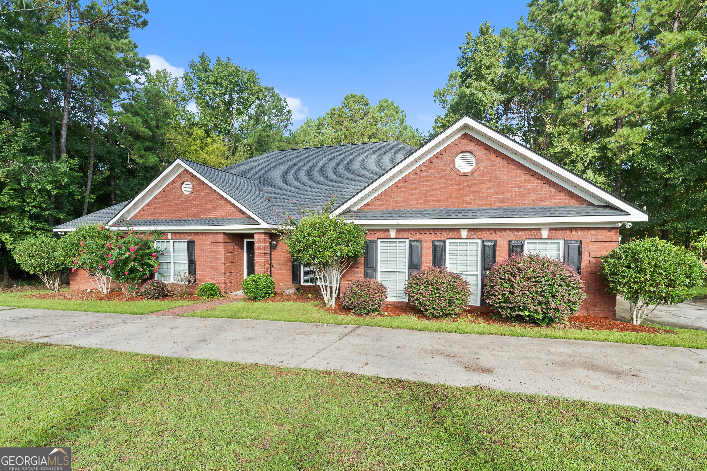 Welcome to this beautiful all-brick home located in the gated community of Greystone Arbor. Offering 3,448 square feet of living space, this property features four spacious bedrooms and three and a half bathrooms. A brand new roof provides peace of mind, while the thoughtful layout offers both comfort and functionality. The home includes a two-car garage and plenty of living space designed for everyday living and entertaining. Greystone Arbor provides a lifestyle of convenience with access to a clubhouse, pool, and tennis courts. Situated in a prime Milledgeville location, this home is close to shopping, dining, schools, and Lake Sinclair recreation. Combining size, style, and amenities, 211 Greystone Drive is a wonderful opportunity to own in one of the area's most desirable communities.