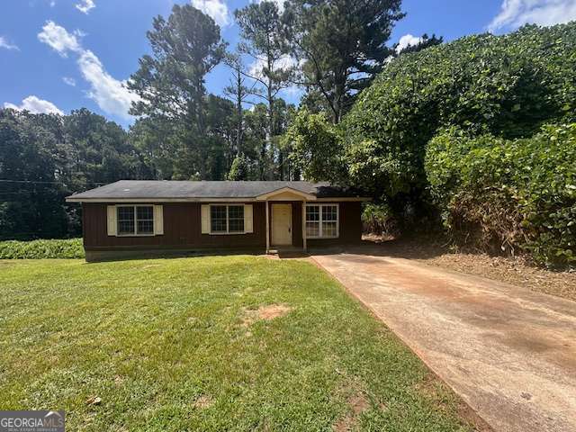 Bring your vision to this 3-bedroom, 1-bath home nestled in a quiet Covington neighborhood. Whether you're a first-time buyer ready to build equity or an investor seeking your next opportunity, this property is full of potential. The home features a functional layout and a spacious, flat yard-perfect for outdoor living, pets, or future improvements. With some updating and care, this home can truly shine. Conveniently located near schools, parks, shopping, and major routes, this is a smart investment in a growing area. Don't miss your chance to transform this hidden gem!