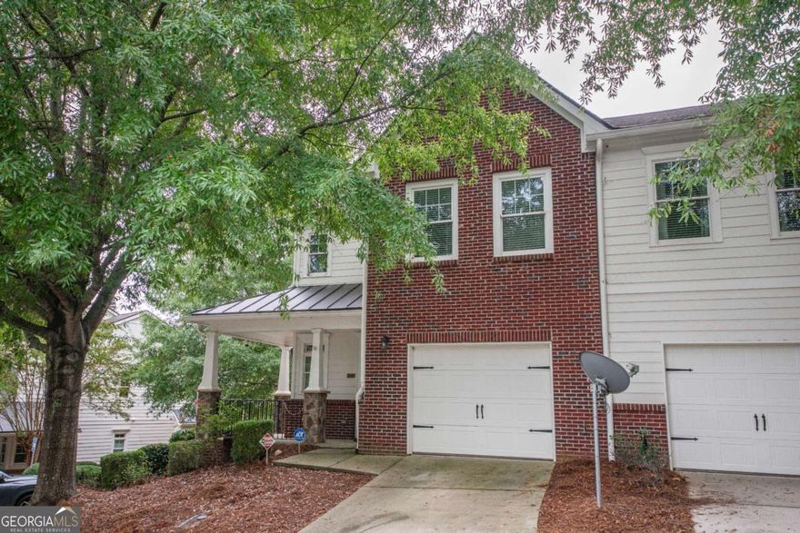 150 The Preserve Unit H2 All of the comforts and spaciousness of a single-family home, with the convenience of condo living. This rare, two-story end unit offers a partial wrap-around porch, extra light, and a sense of privacy that's hard to find - all in one of the hottest locations in town.  Step inside to discover 9-foot ceilings, custom built-ins, detailed trim work, and hardwood floors throughout the main level. The modern kitchen features stainless steel appliances, custom cabinetry, large windows surrounding the open floor plan with views of the backyard lawn and woods. Cozy up by the fireplace or entertain guests with this very livable floor plan. Dedicated outdoor space gives it an indoor/ outdoor feel. Upstairs, you'll find two spacious owner's suites, each with tray ceilings, sitting areas, and large closets. Both bathrooms offer granite double vanities, tile floors, and separate tubs and showers, giving each suite a spa-like feel. A brand new tankless water heater provides hot  water on demand. Additional highlights include a one-car garage plus extra parking pad, a private rear patio and  deck perfect for grilling or entertaining, and a lush sodded backyard. Recent updates include  fresh interior paint, new carpet upstairs, and exterior paint within the past three years. Residents enjoy swim, trash service, exterior and grounds maintenance - all for just $130 per  month. It's easy, elegant, and effortless living - precisely what makes The Preserve at Mitchell  Bridge one of Athens' best-kept secrets. Don't wait-schedule your showing today and see why this community remains unmatched in  value, style, and location. Showings begin November 8th; appointment-only. Please give at least  three hours' notice.