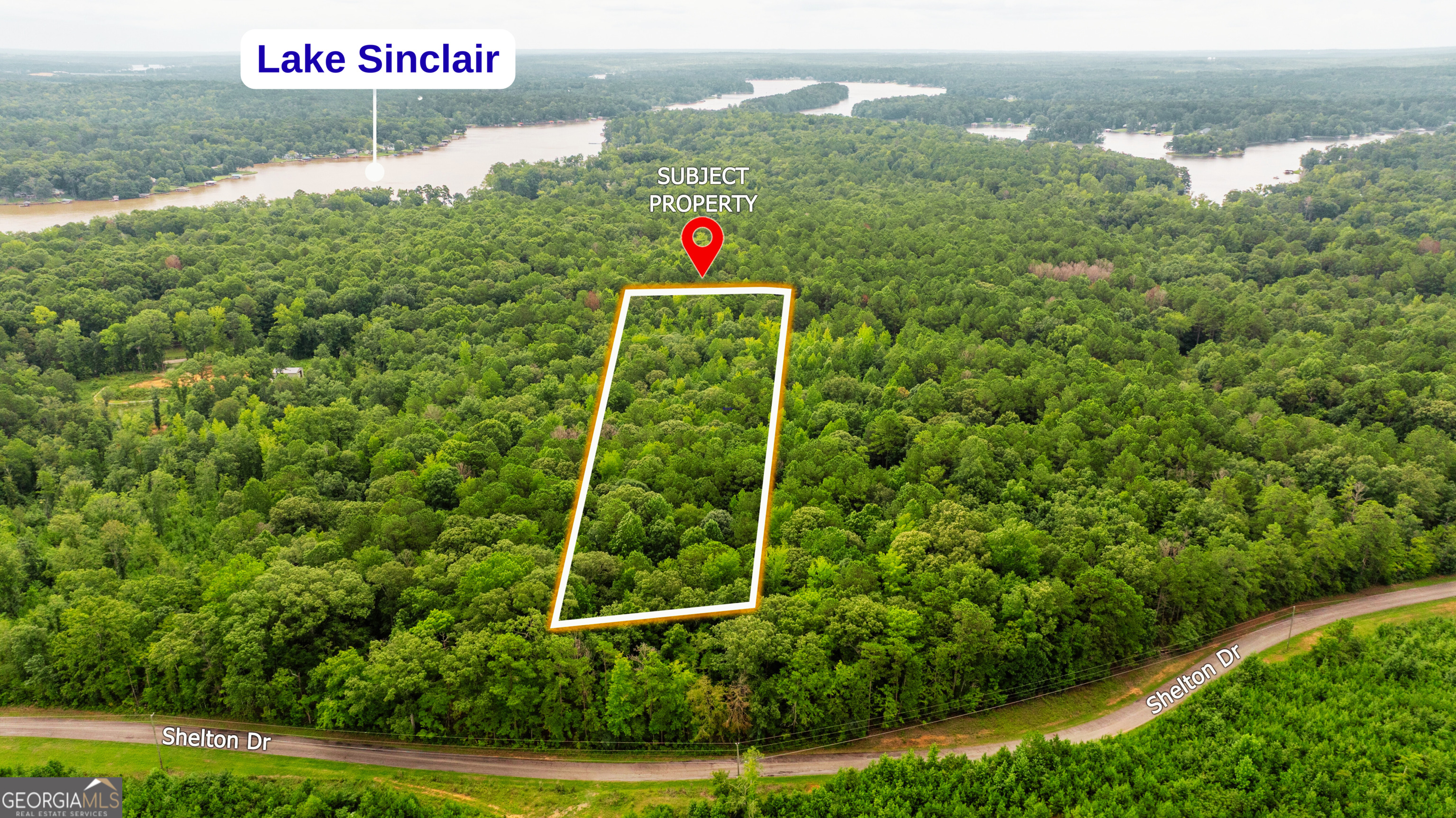 This wooded, buildable parcel offers excellent road frontage - 135 feet along paved Lakeshore Drive and spans 2.73 acres in a peaceful residential area of Putnam County, Georgia. Located less than 5 minutes from Lake Sinclair and just 4 miles from Twin Bridges Marina, this property is ideal for building a custom home or a weekend retreat near the water. New survey recorded with county and lot lines marked on the ground; this lot is ready to build. Soil / perc report passed as well. County water and electricity are available on the road. Zoned Residential, the lot allows for single-family homes. The gently sloped terrain and natural tree cover offer privacy and flexibility for design. With no HOA, no deed restrictions, and no timeline to build, this land presents a rare opportunity to enjoy rural living with convenient access to boating, fishing, and lake recreation. Located near Eatonton, Milledgeville, and area marinas, the lot blends privacy with proximity to all Lake Sinclair has to offer.