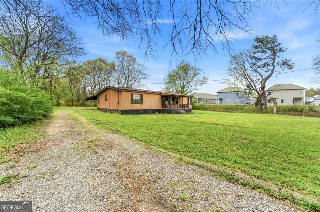 Photo of 85 Honeysuckle Drive SW, Cartersville, GA 30120 (MLS # 10722325)