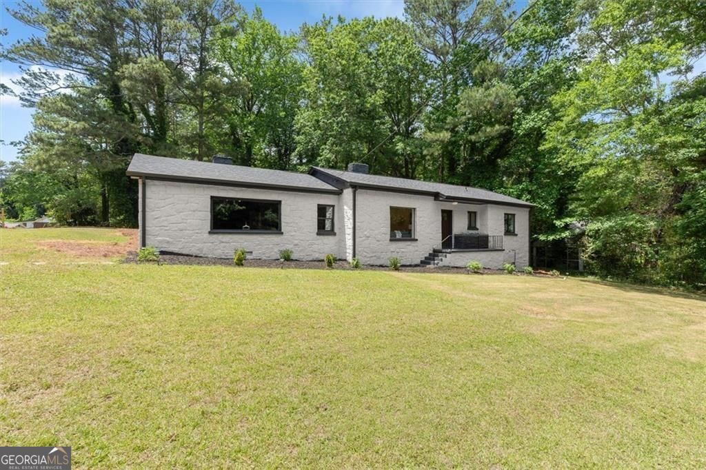 Photo of 1595 Pinehurst Drive SW, Atlanta, GA 30311 (MLS # 10768689)