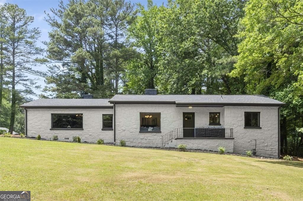 Photo of 1595 Pinehurst Drive SW, Atlanta, GA 30311 (MLS # 10768689)