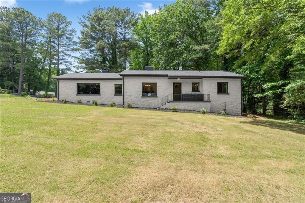 Photo of 1595 Pinehurst Drive SW, Atlanta, GA 30311 (MLS # 10768689)