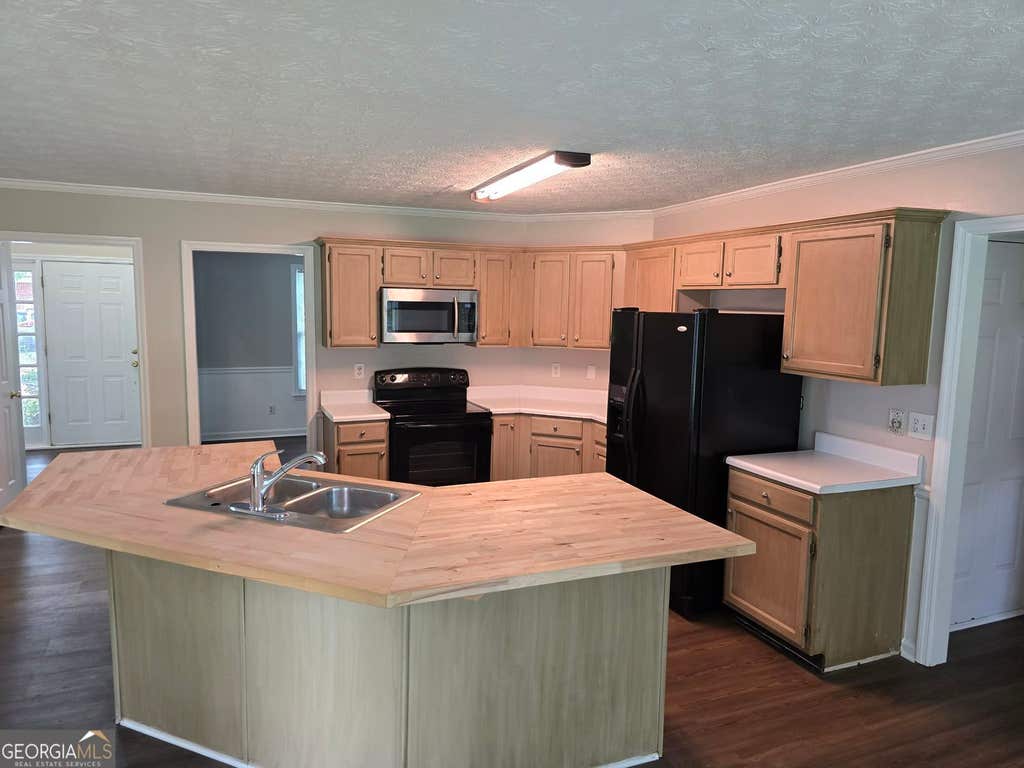 Photo of 724 Jamie Way NE, Woodstock, GA 30188 (MLS # 10810779)