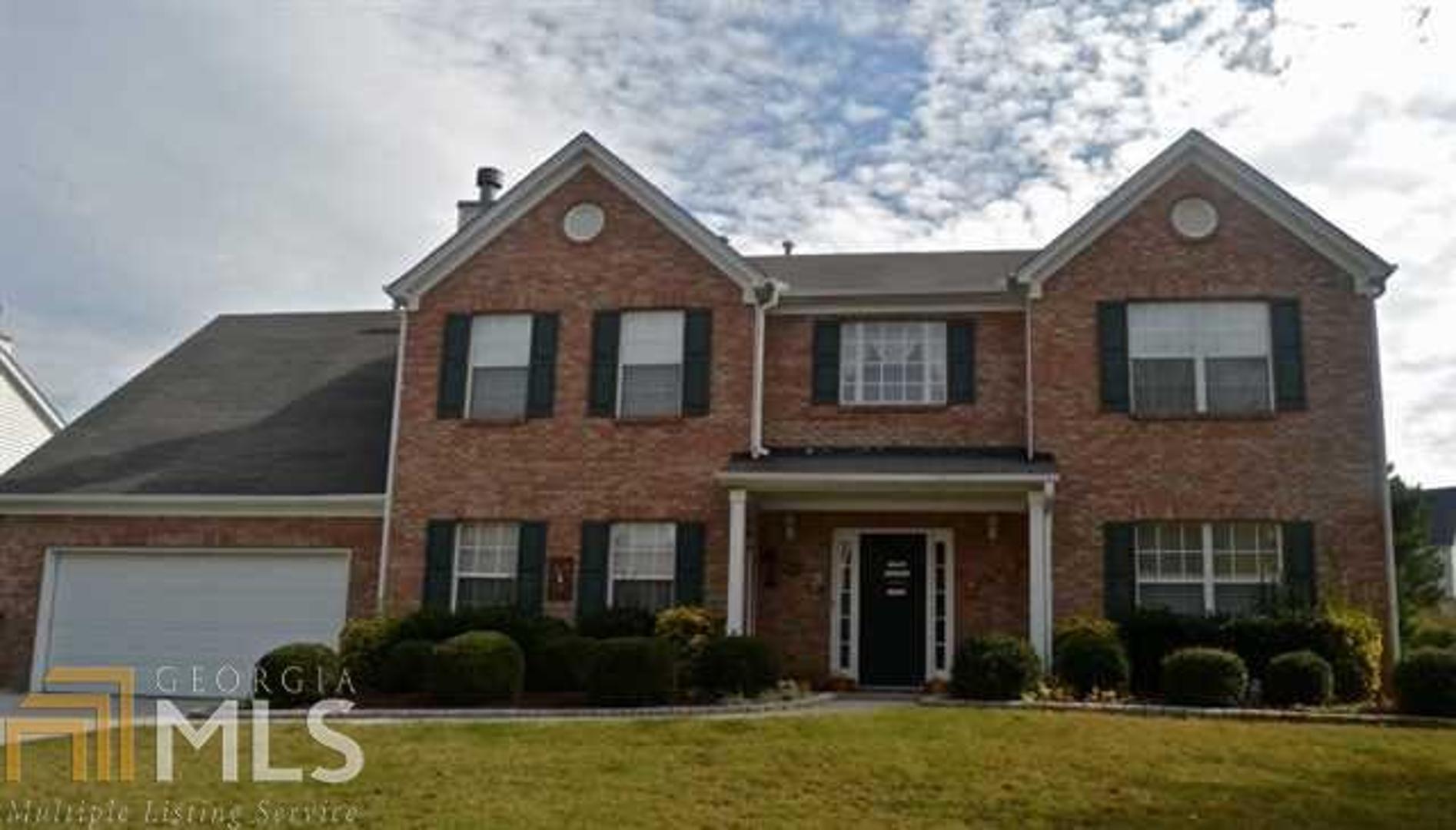 Brick Front Home located in desirable Swim/Tennis Community. This home offers a bright 2 story foyer, spacious family, living & dining rooms. The open large kitchen with cozy breakfast area offers lots of cabinets and storage area. Extra details in home include hardwood & tile floors through out as well as a 2 car garage with an extra storage room. The beautiful large, private and fenced back yard has extras like extended decks, fire pit and outdoor lighting. Marlowe Estates is conveniently located mins from I85, Hwy 316 and Mall of Georgia.